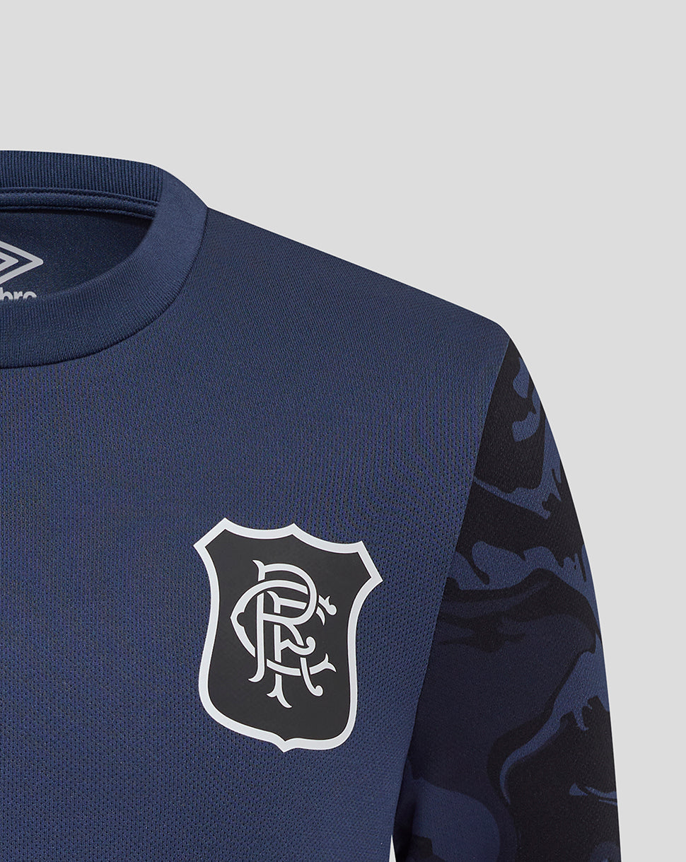 Close up of Rangers Junior tee front focusing on the crest and round neck with camo sleeve detail.