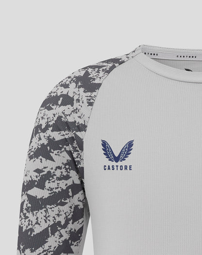 Grey junior training T shirt with camouflage sleeves, round neck, Castore logo and club crest on chest
