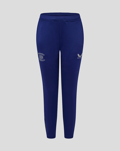 Blue Preston junior training pants with pockets, crest on left thigh and Castore logo on right thigh.