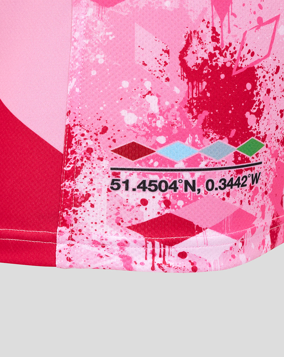 Close-up of pink splatter print on Harlequins away shirt showing coordinate graphic and authenticity badge