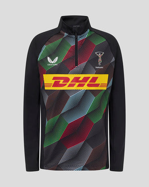 Harlequins junior matchday quarter zip top with a bold multicolor geometric front and black sleeves.