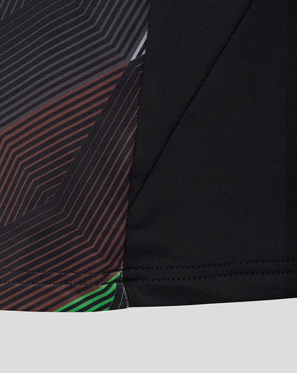 Lower front panel of Harlequins junior quarter zip top with diagonal stripe pattern and black sleeve