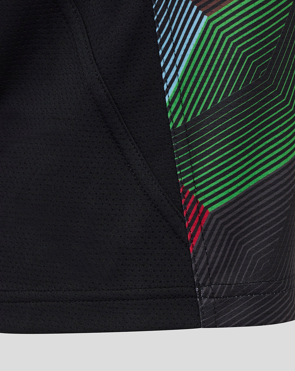 Close-up of the side panel on the Harlequins matchday tee showing multicolor diagonal stripes on a black base