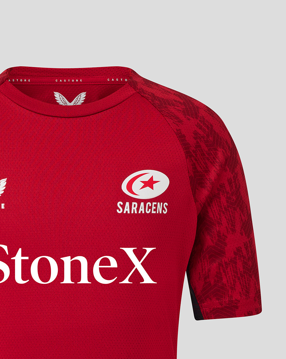 Red Saracens training tee close up of chest with StoneX across front and Saracens emblem on left chest