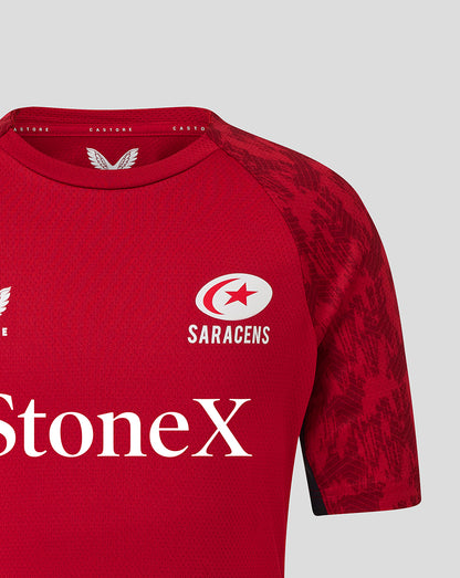 Red Saracens training tee close up of chest with StoneX across front and Saracens emblem on left chest