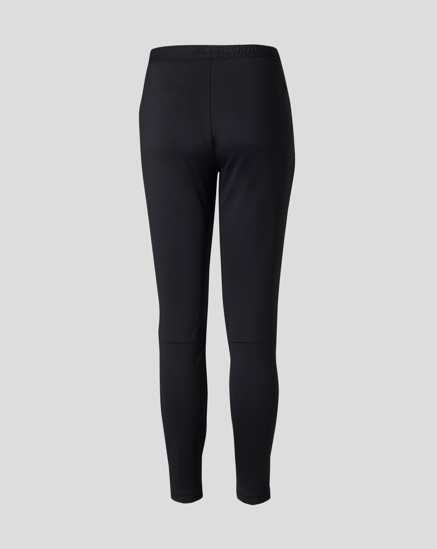 Back view of black West Ham Junior Pro Training Knit Pants with elastic waistband.