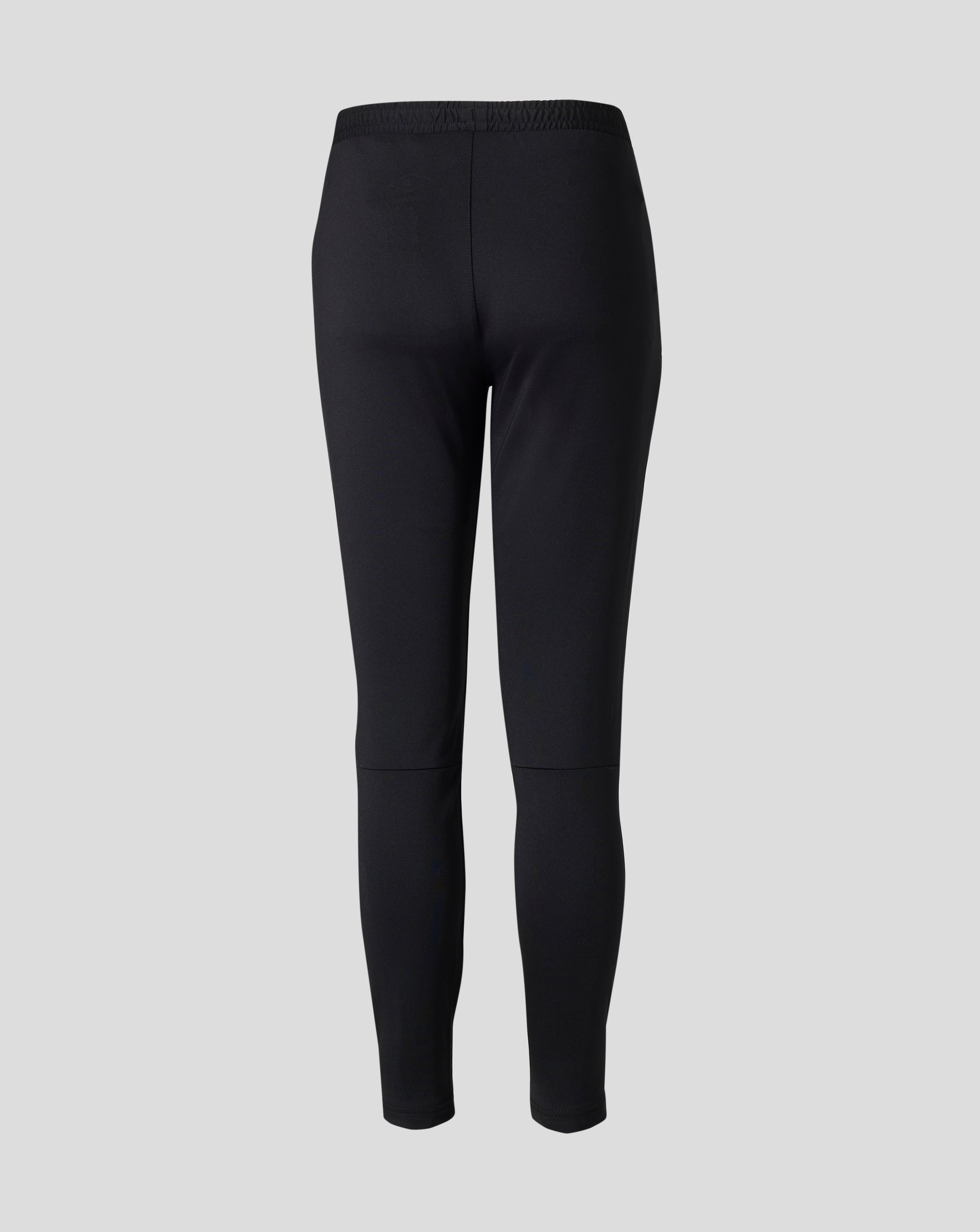 Side view of Spellbound black West Ham Junior 25/26 Pro Training Knit Pants showing the crest on the left thigh