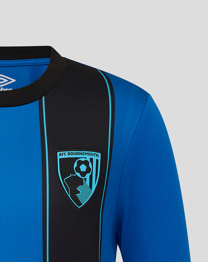Close-up of left chest crest on blue AFC Bournemouth junior away shirt with black stripe panel.