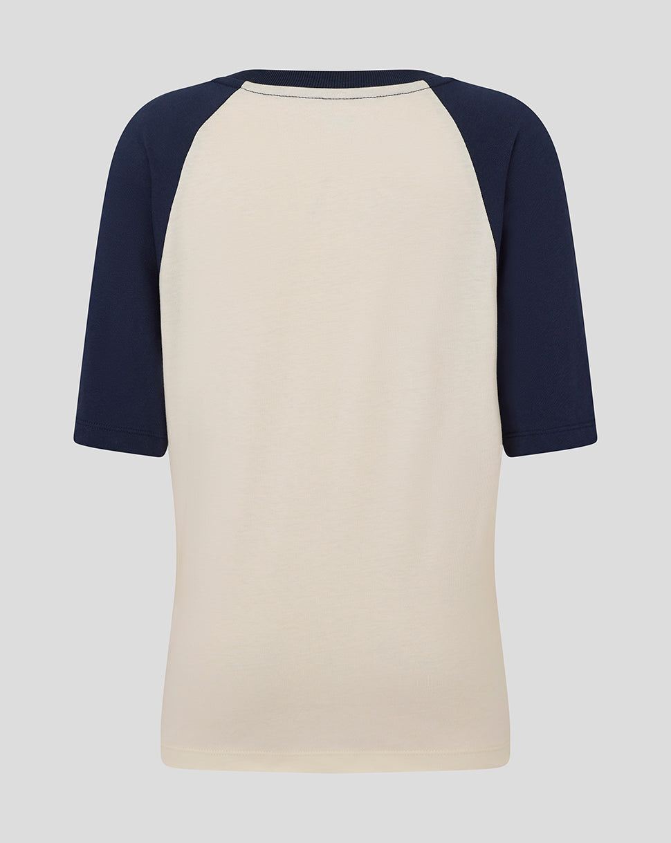 Back view of beige raglan tee with navy sleeves