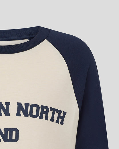 Close up of a Preston Junior raglan tee with beige body and navy sleeves