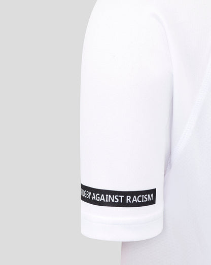 Cuffed sleeve of white Bath Rugby shirt featuring a black Rugby Against Racism band along the edge