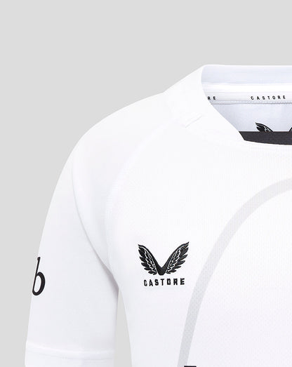 Detail of white Bath Rugby jersey showing Castore branding at the collar with a partial club badge