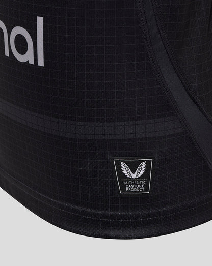 Lower front of Bath Rugby replica shirt displaying the authentic Castore product badge and grid pattern