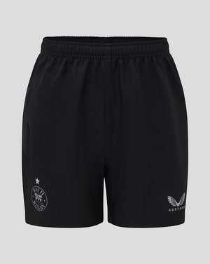 Junior Bath Rugby shorts in black with team badge on left leg and Castore logo on right