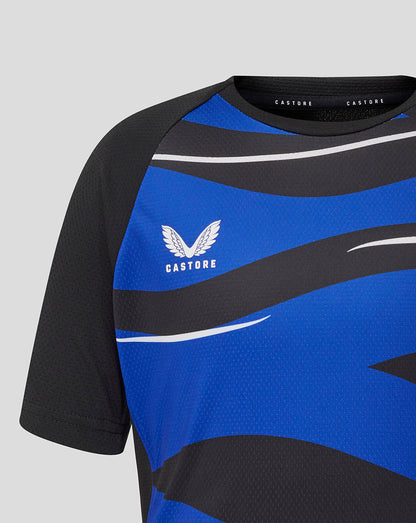 Close-up of the front upper chest showing blue and black graphic with Bath Rugby crest and Castore branding.
