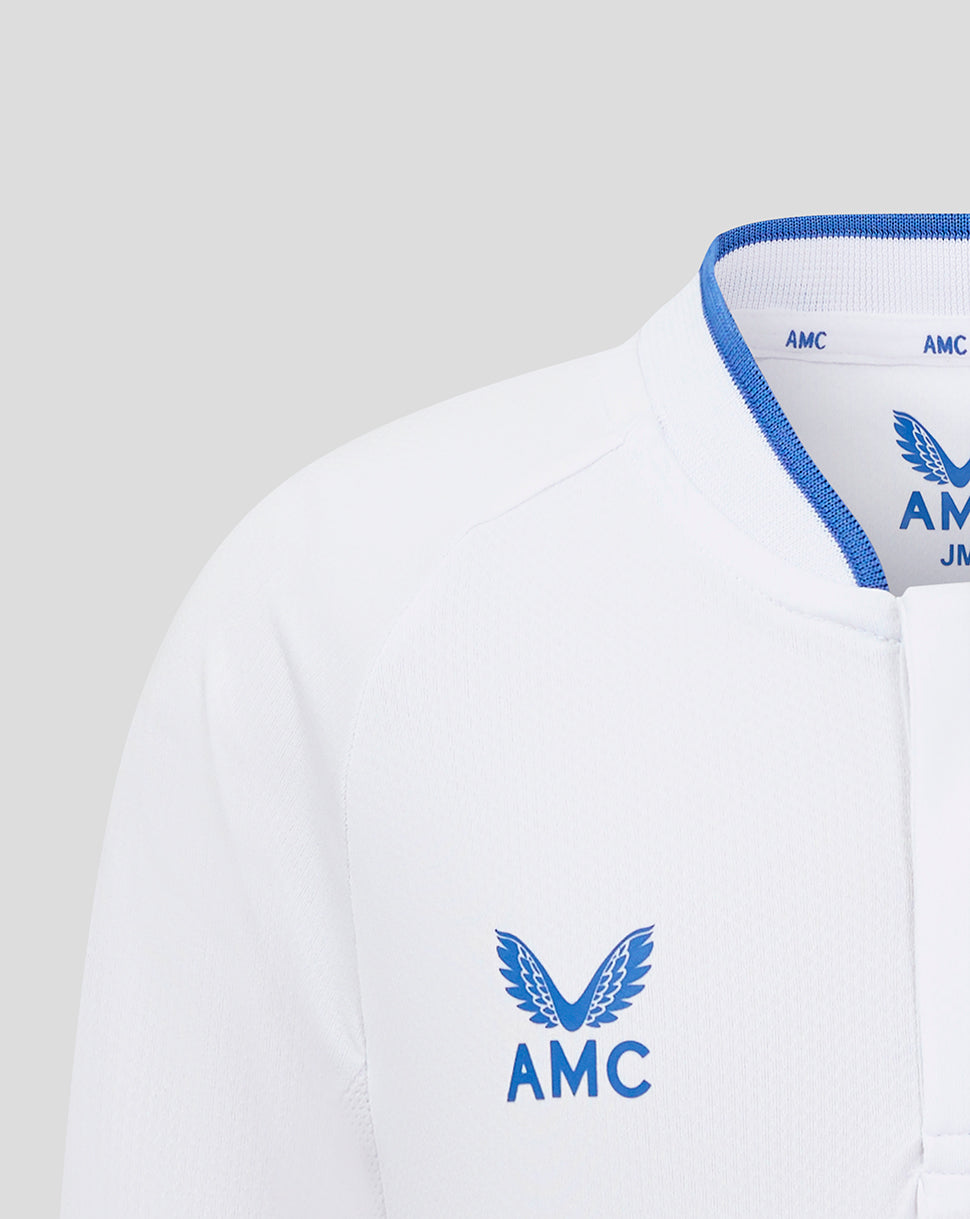 White long sleeve polo with blue trimmed collar and AMC wing logo on the chest