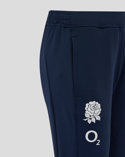 Close-up of rose crest and O2 logo on the right thigh of navy England rugby pants