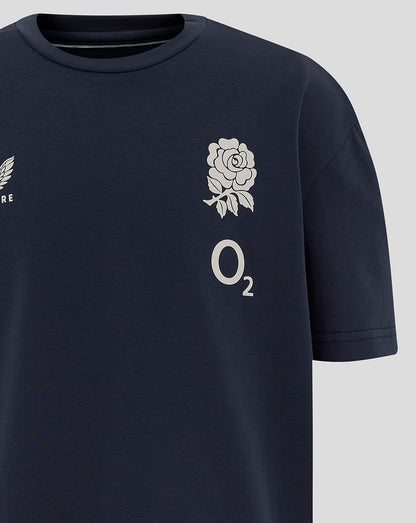 Close up of navy T shirt chest showing rose crest and O2 logo.