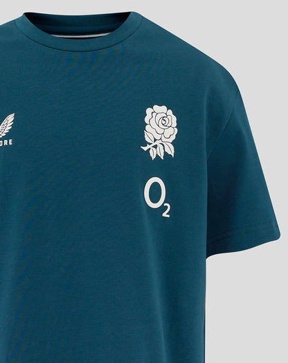 Front view of teal Junior England Rugby Travel Short Sleeve T Shirt with rose crest on chest and Castore logo