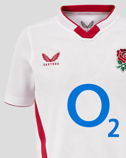 Front view of Junior England Rugby Home Pro Shirt in white with red collar trim, embossed fabric, rose crest left chest, O2 center, Castore logos.