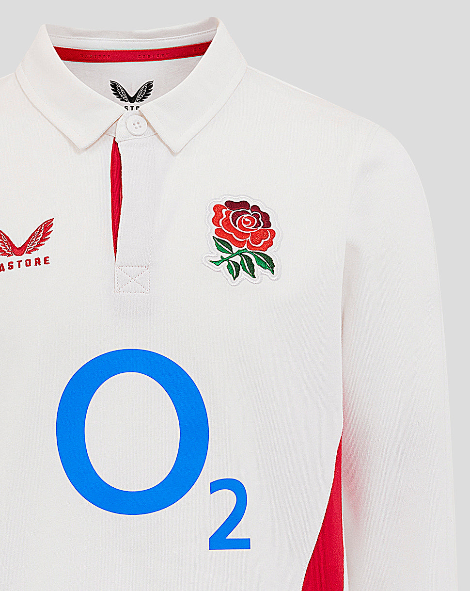 Close up of the white junior England Rugby shirt collar area showing the rose crest left chest, red placket trim and large O2 logo center