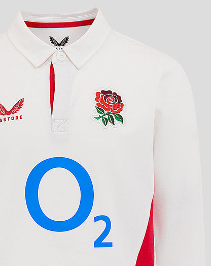 Close up of the white junior England Rugby shirt collar area showing the rose crest left chest, red placket trim and large O2 logo center