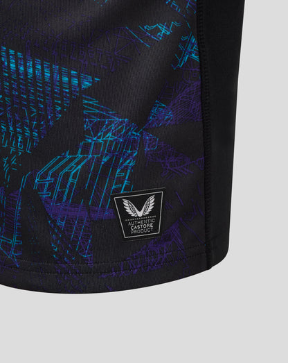 Close up of dark jersey with blue purple graphic and Castore badge