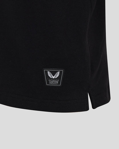 Close-up of black England Rugby junior shirt hem with Castore authenticity badge