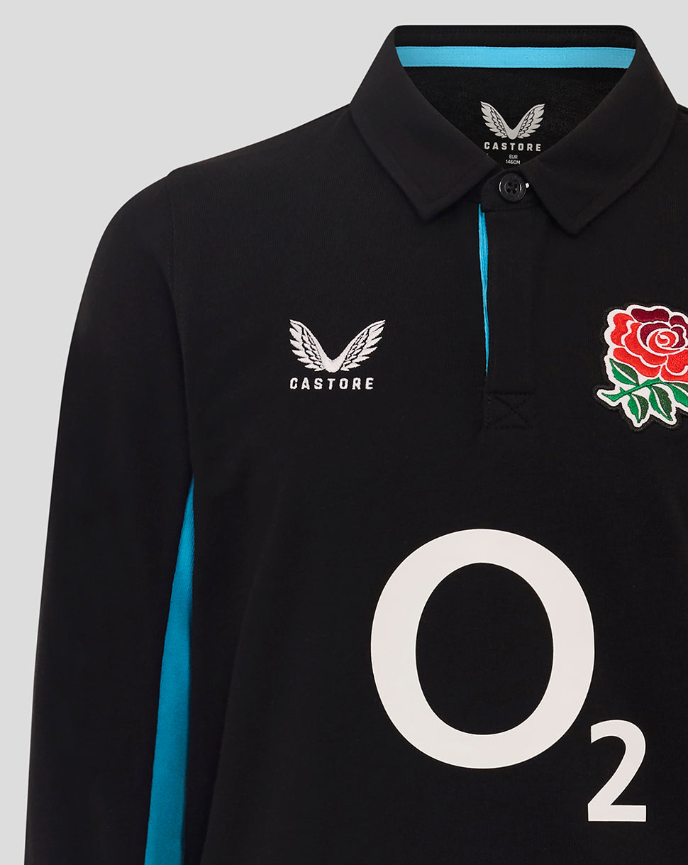 Close up of front of black rugby shirt showing turquoise side stripe, Castore logo on the chest, rose badge, and prominent O2 graphic.