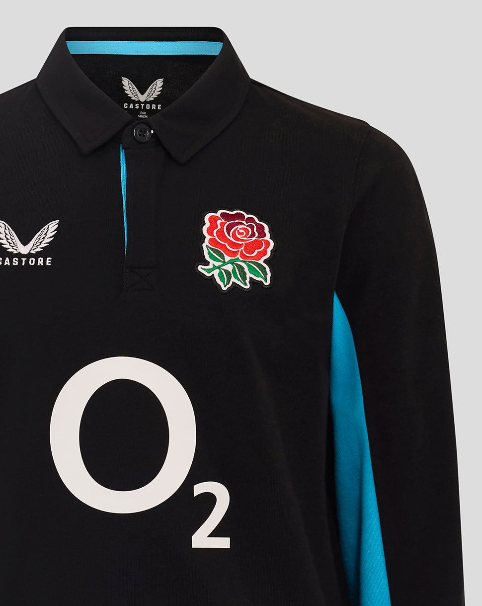 Front view of black rugby shirt with turquoise collar trim, Castore logo on the left chest, rose badge on the right, and a large O2 graphic.