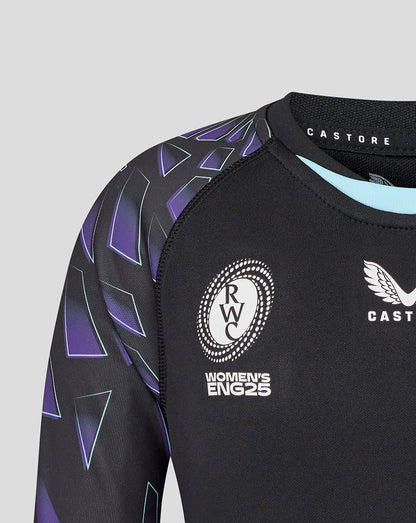 Shoulder view of the shirt with Women's ENG25 crest and Castore logo on black fabric with purple sleeve pattern.