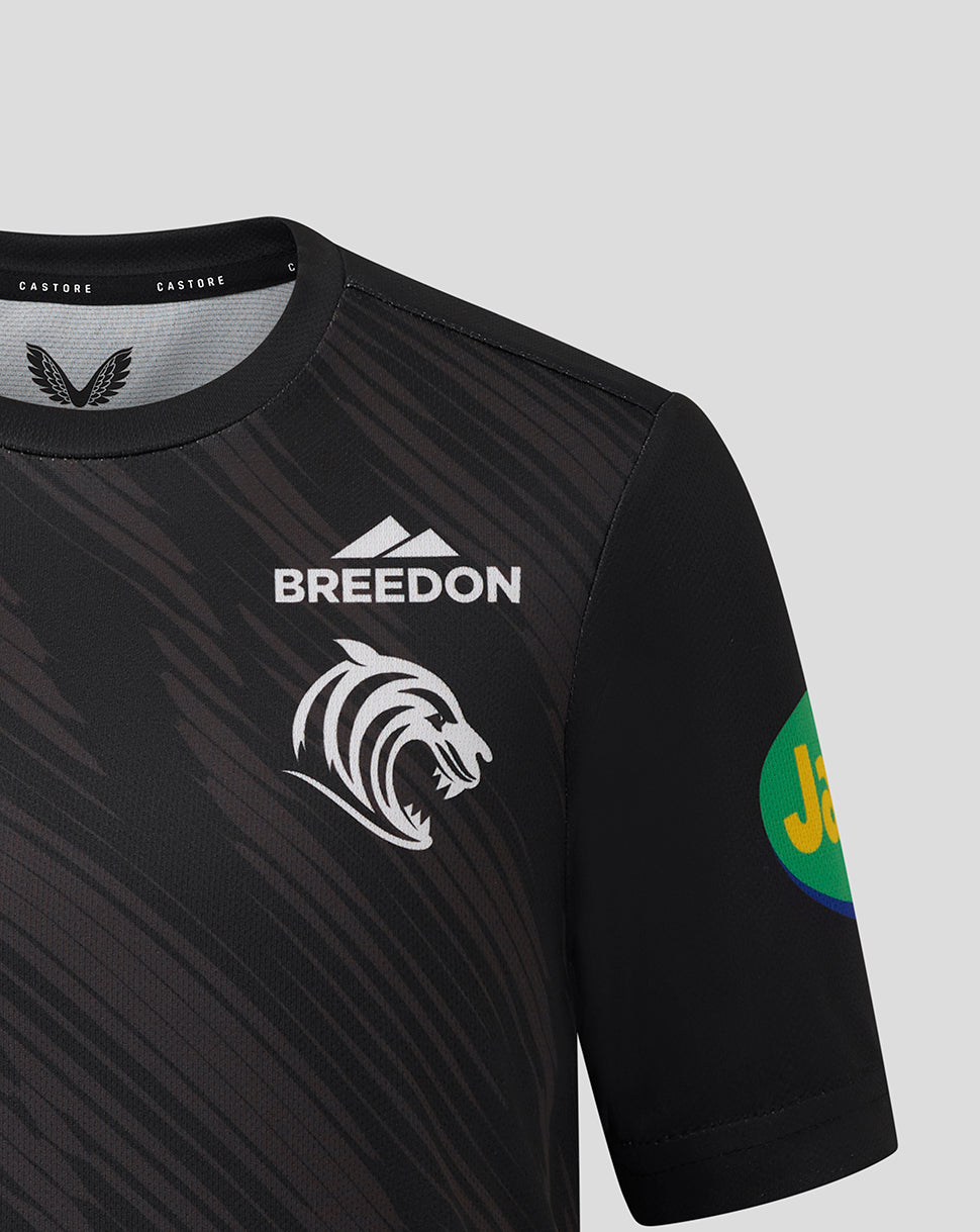 Chest view of black Leicester Tigers shirt showing Breedon logo and tiger head crest with a Jaffa sponsor patch on the sleeve.