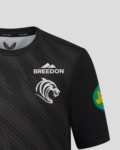 Chest view of black Leicester Tigers shirt showing Breedon logo and tiger head crest with a Jaffa sponsor patch on the sleeve.