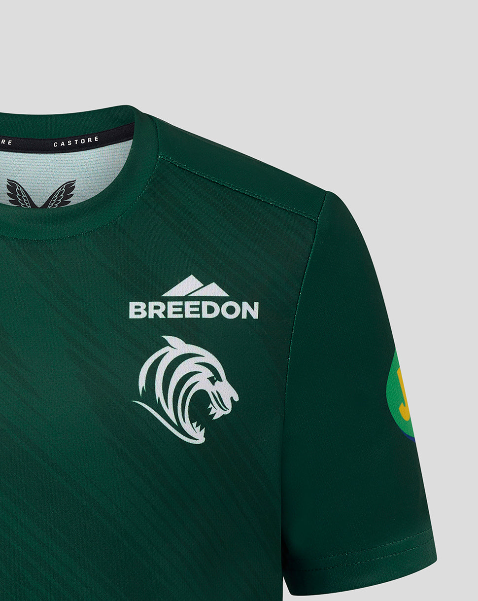 Shoulder and chest close up of dark green Leicester Tigers junior warm up T shirt displaying Breedon branding and tiger head