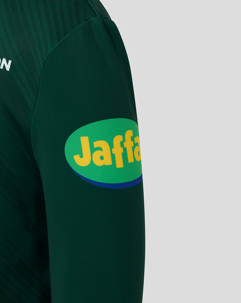 Sleeve close up of the dark green training jacket with Jaffa sponsor patch.