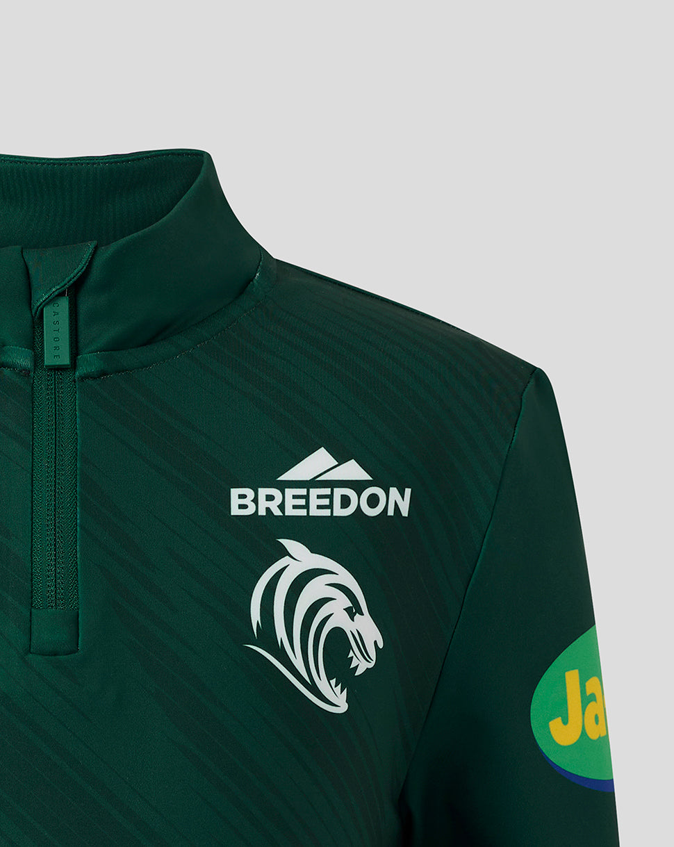 Dark green Leicester Tigers Junior training quarter zip with Breedon logo and tiger head crest on the chest.