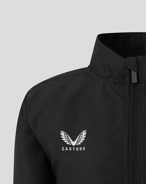 Close-up of black Leicester Tigers Junior Woven Pre Match Jacket showing Castore logo on left chest and tiger emblem on right chest