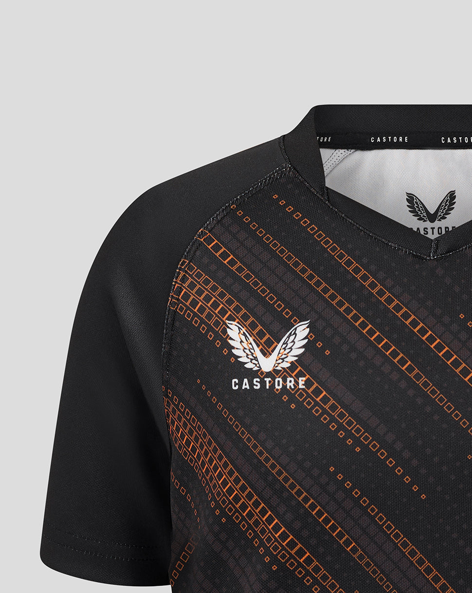 Black Leicester Tigers junior 25/26 warm up jersey with orange geometric lines and Castore branding