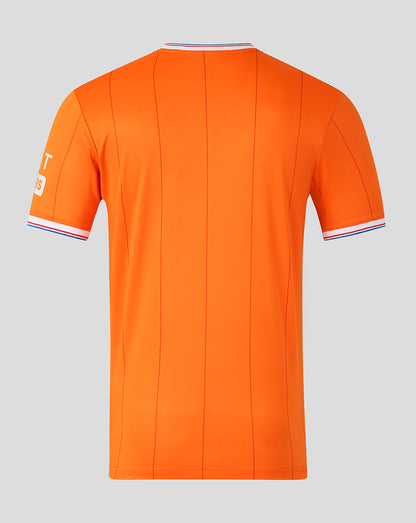 Back view of orange Rangers Junior 25/26 Fourth Shirt with vertical seam lines and striped collar.