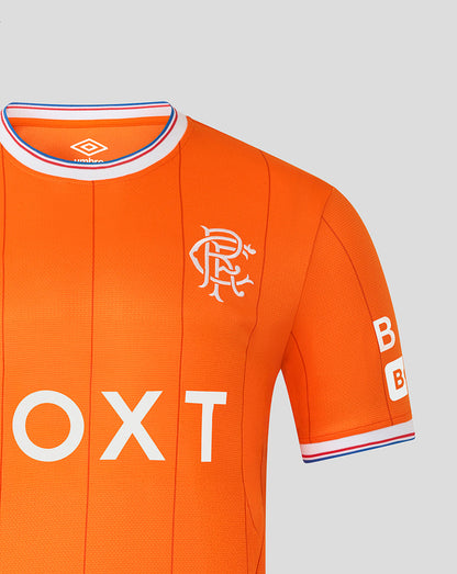 Close up of orange Rangers infant fourth shirt showing crest and BOXT sponsor with striped sleeve cuff and collar trim
