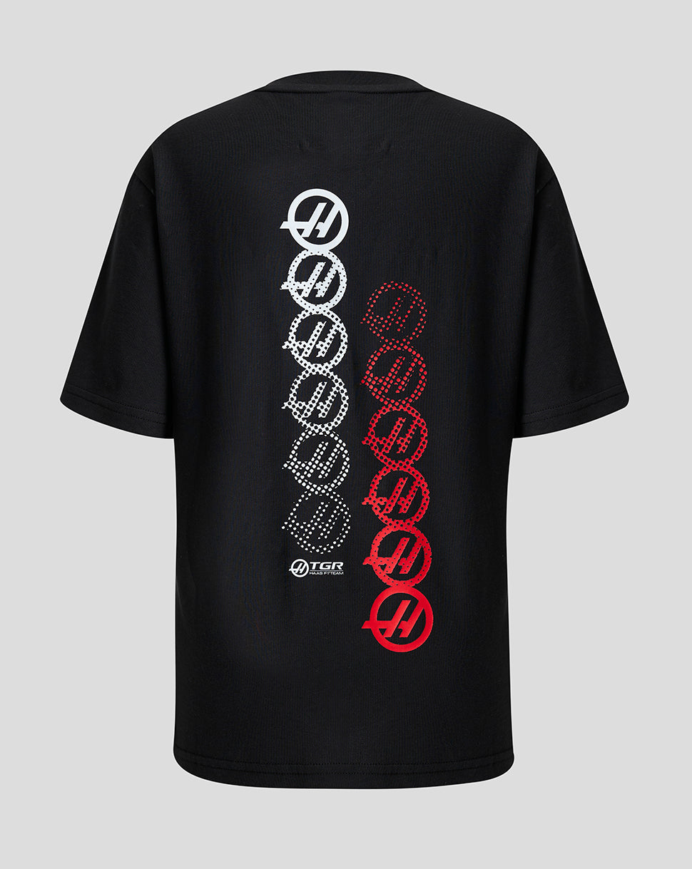 Haas F1 Team Junior Monogram back graphic on a black short sleeve tee with vertical white and red circular logos