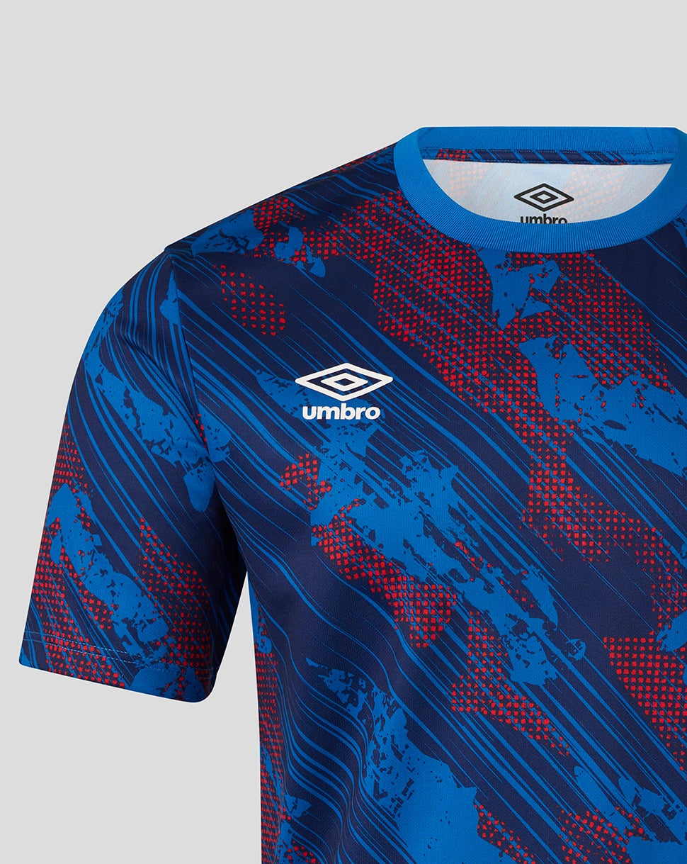 Close-up of the chest area on the Armed Forces Day jersey showing blue red graphic print, Umbro diamond and Rangers crest