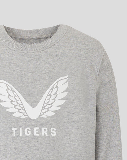 Grey Leicester Tigers junior travel sweatshirt close up of white wing logo on chest