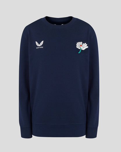 Navy blue sweatshirt with embroidered designs on a light gray background