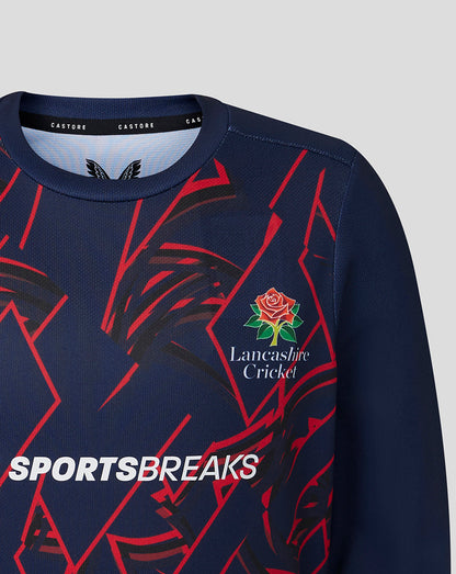 Navy sports jersey with red patterns and Lancashire Cricket logo on a gray background