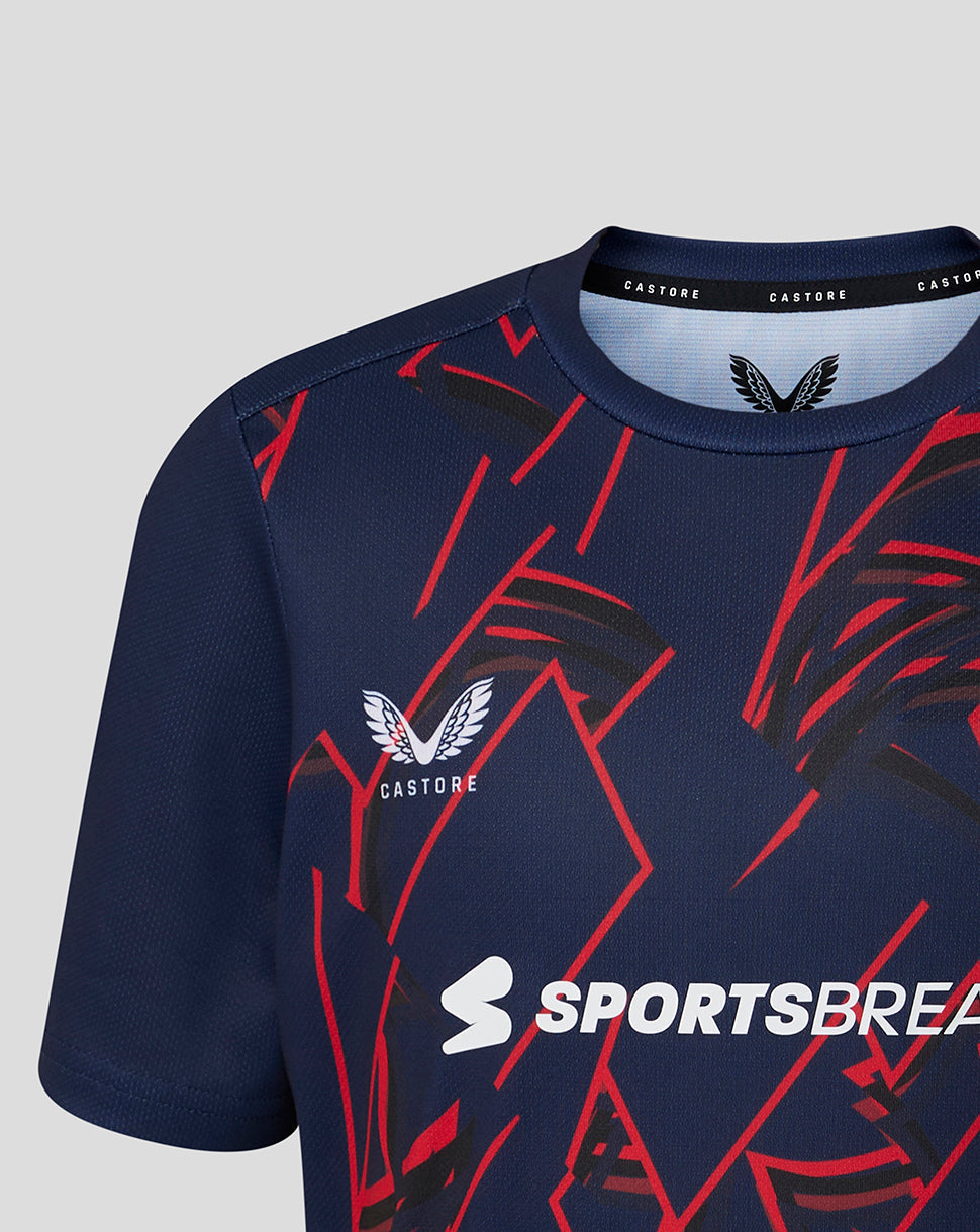 Navy blue sports jersey with red and white abstract design on a light gray background