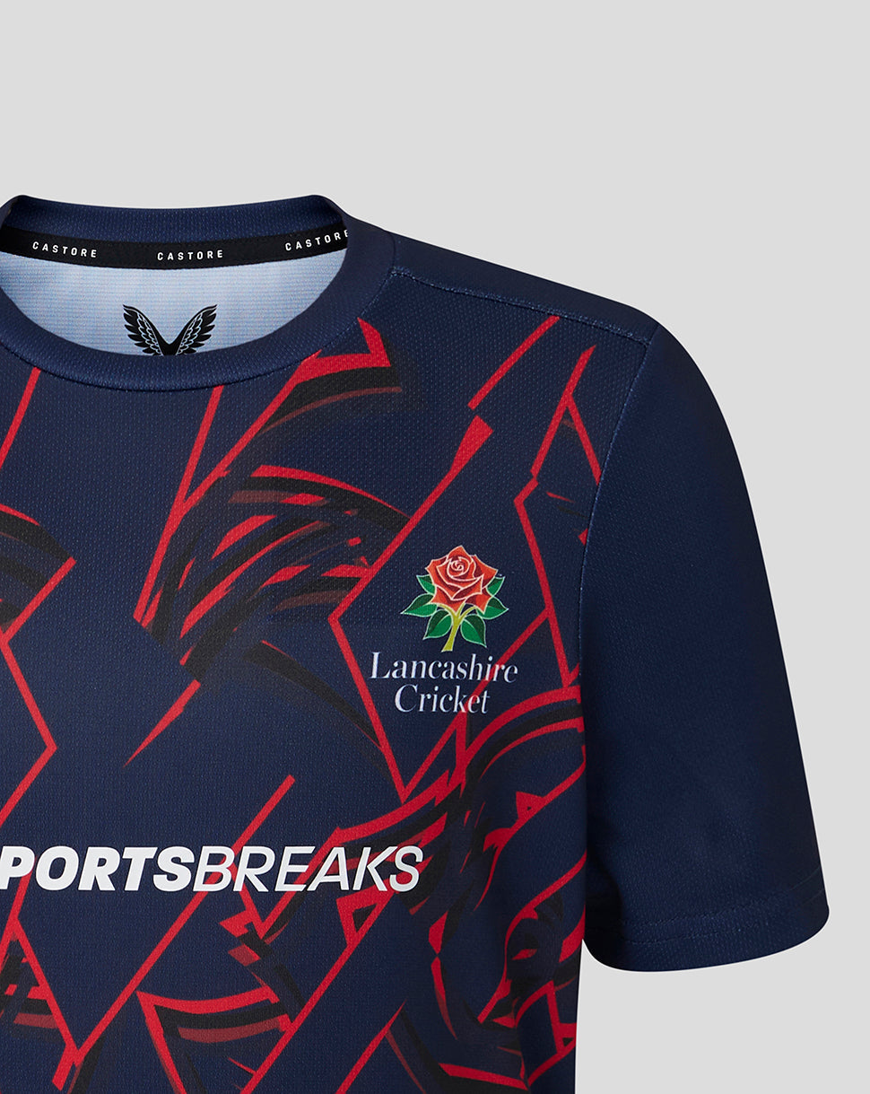 Navy sports jersey with red geometric patterns and Lancashire Cricket Club logo on a gray background