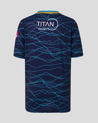 Navy blue sports jersey with blue pattern and 'Titan Wealth' logo on a gray background