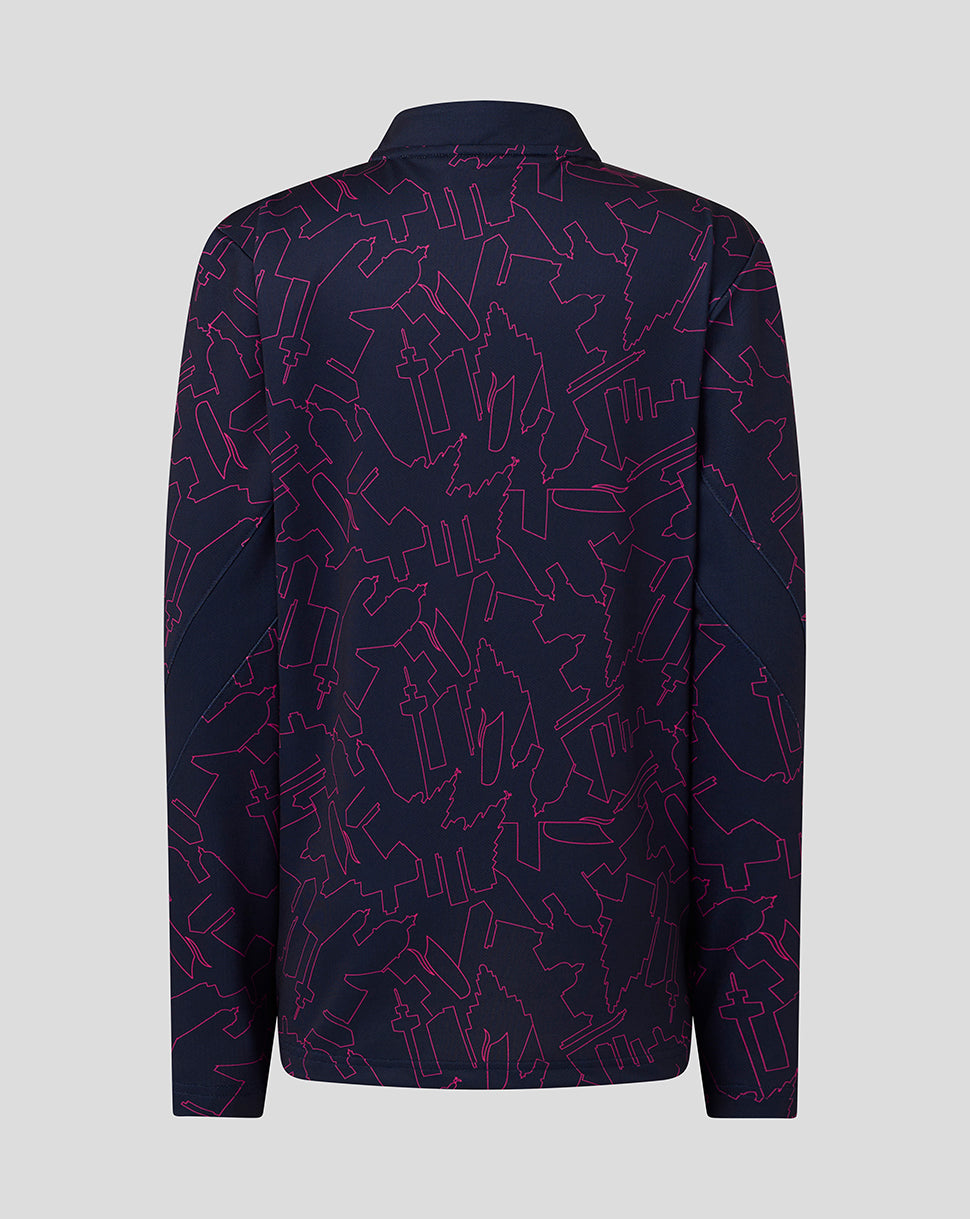 Navy shirt with red geometric pattern on a light gray background