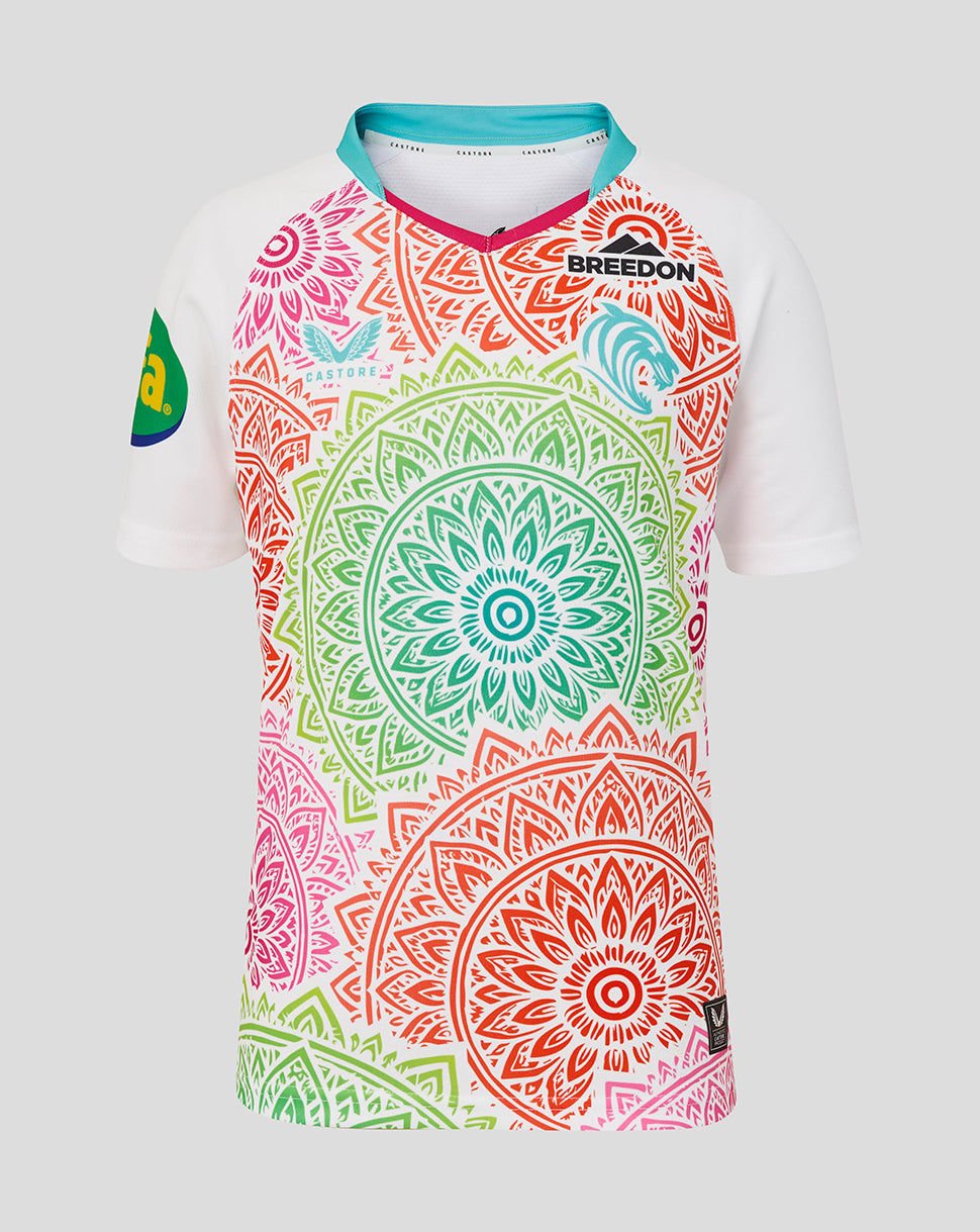 Colorful mandala-patterned shirt with 'Breedon' branding on a light gray background
